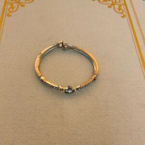 Elegant Gold Bracelet with Silver Accents